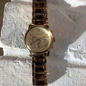Michael Kors womens gold watch with tortoiseshell